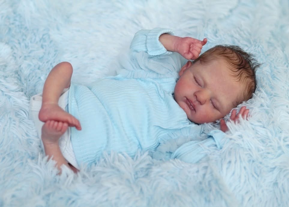 Reborn doll — blue outfit